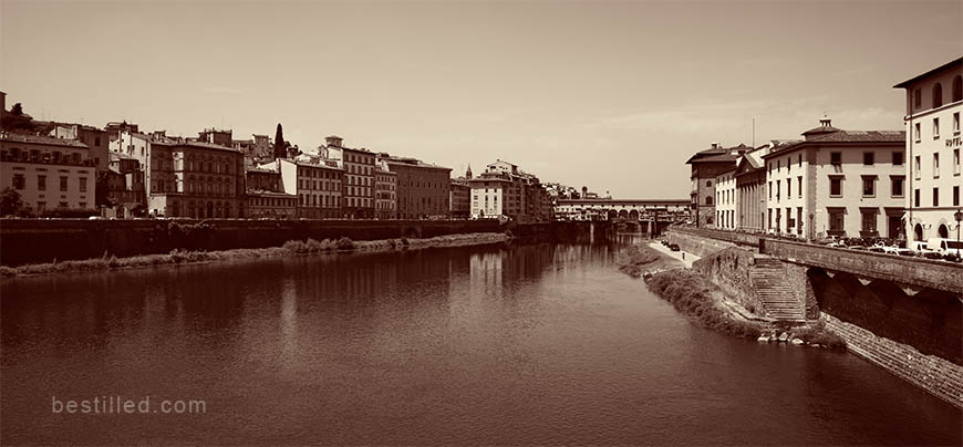 The Arno river through Florence, Italy, art photograph in brown by Joseph Westrupp.