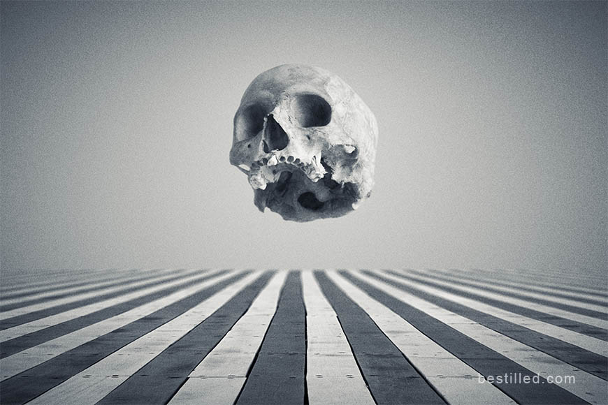 Skull floating over walkway, surreal art photo by Joseph Westrupp.