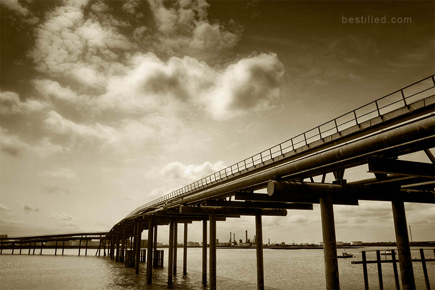 Sepia art photograph of Occidental Jetty over the Thames, Canvey Island, England, by Joseph Westrupp.