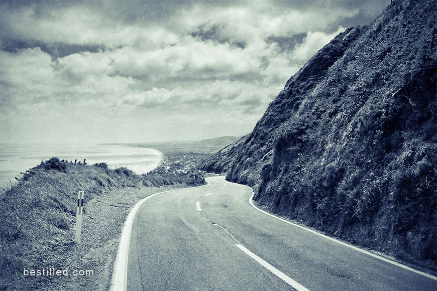 Art photo of hills, road, and sea, in Paekakariki, New Zealand. By Joseph Westrupp.
