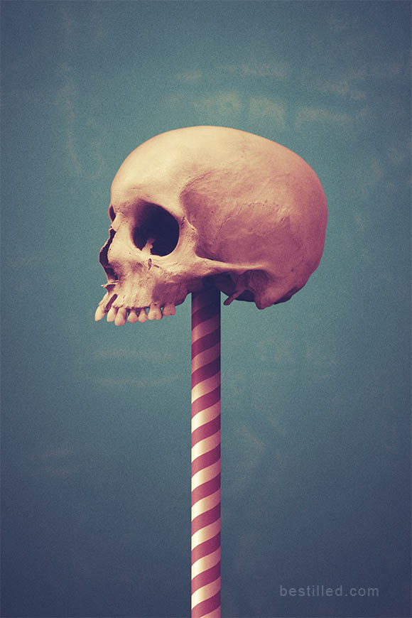 Yellow skull on red-striped pole, surreal art by Joseph Westrupp.